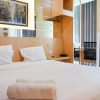 Отель Cozy Studio With City View At Tamansari Papilio Apartment, фото 4