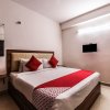 Отель OYO 16469 Pramukh Hotels, фото 7