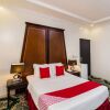 Отель Al Hamra Palace Al Jawazat Branch by OYO Rooms в Эр-Рияде