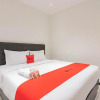 Отель RedDoorz Plus @ Pakuan Residence Tajur, фото 2