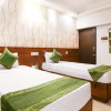 Отель Treebo Comforts Inn, University Road Deralakatte, фото 11