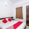 Отель OYO 13941 NR Suites, фото 5