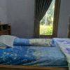 Отель Homestay Mbah Pomo Sriharjo, фото 3