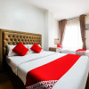 Отель OYO 256 Sakura Suites, фото 4