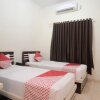 Отель OYO 765 Wisma Andalas Asri Syariah, фото 3