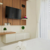 Отель Well Appointed and Homey Studio at Sky House BSD Apartment, фото 1