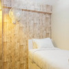 Отель Modern 2BR with City View at Bassura Apartment, фото 11