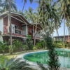 Отель Capital O 70228 Coco Farm Resort, фото 43