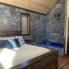 Отель Standing Bear 0 Bedroom Cabin, фото 10