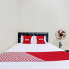 Отель OYO 92594 Raja Ratu Homestay, фото 13