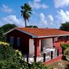 Отель Tropical bungalow in Seru Coral Resort Curacao with beautiful gardens, privacy and large pool, фото 9