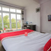 Отель OYO 135 Lost Garden Apartment and Guest House, фото 23