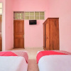 Отель OYO 2061 Rizki Dhira Guest House Syariah, фото 23