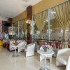 Отель Capital O 615 Residence Puri Hotel Syariah, фото 15