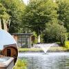 Отель Modern chalet with sauna and spa, on a holiday park in a wetland area, фото 1