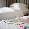 Отель Haikou Guanlan Lake Huayi FengXiaogang film community filmmaker Hotel, фото 6