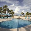 Отель Condado Lagoon Villas at Paseo Caribe в Сане-Хуане-Антигуо