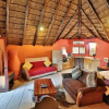 Отель Manzini Swazi King Chalets, фото 4
