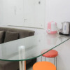 Отель Homey and Cozy 2BR Bassura City Apartment near Mall, фото 5
