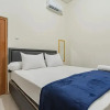Отель The Lima Guest House Syariah By RedDoorz, фото 9