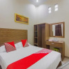 Отель OYO 90327 Hotel Faradisa Syariah, фото 8
