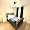 Отель 3 Bedroom Riverview Flat Canary Wharf Free Parking, фото 4