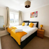Отель Lovely 4 Bedroom Apartment With Free Internet, study and Parking, фото 3