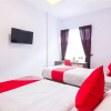 Отель OYO 1118 Artomoro Family Guesthouse, фото 7