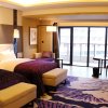 Отель Radisson Blu Hotel Wuhan ETD Zone, фото 1
