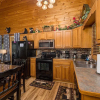 Отель MooseBehaving - Two Bedroom Cabin, фото 10
