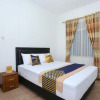 Отель OYO 2268 Tim-tim Homestay Syariah, фото 6