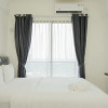 Отель Warm And Cozy Studio Room At Sky House Bsd Apartment, фото 11
