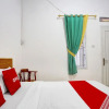 Отель OYO Life 91068 Penginapan Way Semaka Syariah, фото 19
