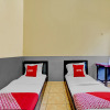 Отель OYO 90405 Penginapan Sasti Kuningan, фото 18