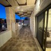 Отель Aboun Rooftop 2bedroom Khsh, фото 24