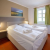 Отель Komfort Appartement mit 1 Schlafzimmern und Terrasse B52, фото 2