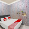 Отель OYO 91782 Satria Homestay Syariah, фото 2