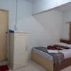Отель Fatimah Guest House Syariah RedPartner, фото 4