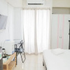 Отель Nice And Spacious Studio At Serpong Greenview Apartment, фото 6