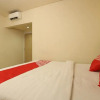 Отель OYO 1314 Wijaya Inn, фото 28