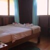 Отель Double Room With Bathroom and Partial View to the Beach, фото 2