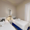 Отель Estoril Beachfront Condo, фото 9