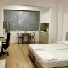Отель Brand new studio apartment in the heart of Tirana! 24h check-in, фото 7