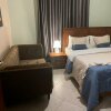 Отель Haven Homes - Ug, a cozy 1 bedroom apartment with Free unlimited wifi & Netflix, фото 2