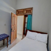 Отель OYO Life 92838 Kost Ibu Surya, фото 8
