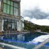 Отель Bihai Shanju Hotel (Yulong Pusujia) в Лицзяне