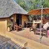 Отель Manzini Swazi King Chalets, фото 8