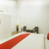 Отель OYO 15225 Rainbow House, фото 24