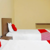 Отель OYO 709 Menjangan Residence at Klayatan, фото 21