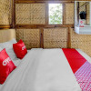 Отель OYO 90225 Rumah Bambu Trawas syariah, фото 3